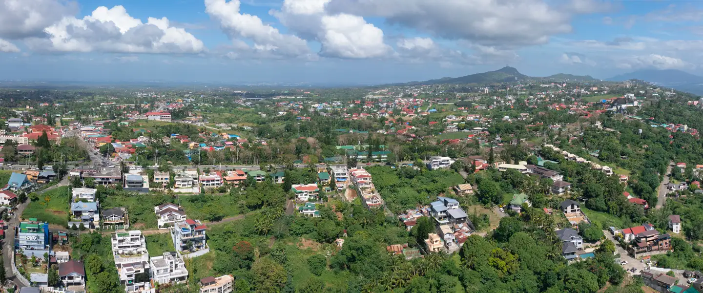 A sweeping broad view of Cavite's sprawling modern landscape, highlighting key highway infrastructure, commercial nodes, and master-planned lifestyle estates.