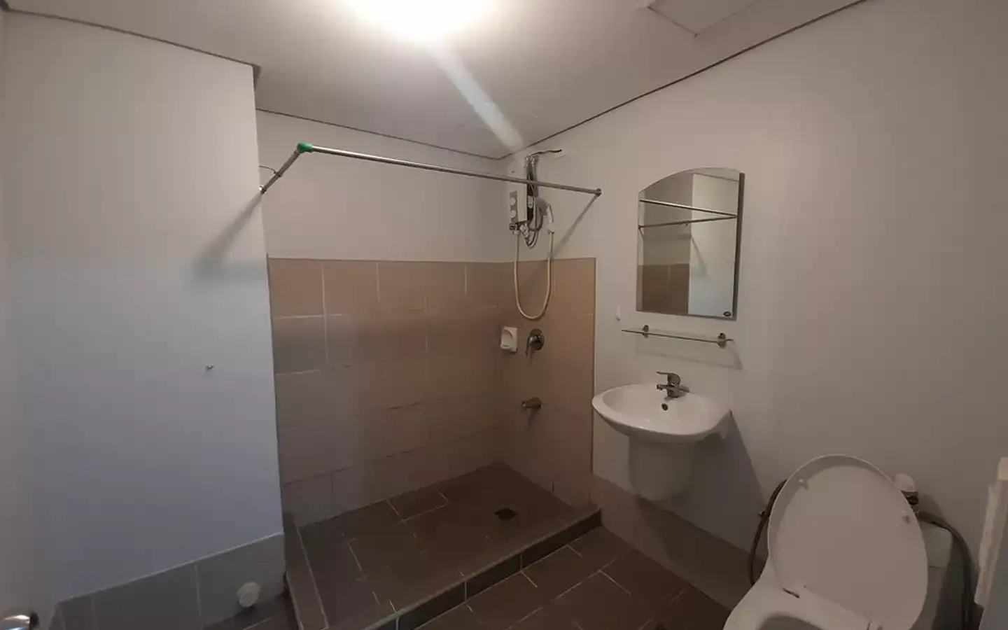 Avida Towers 34th Toilet and Bath Toilet and bath interior of 1-bedroom unit at Avida Towers 34th