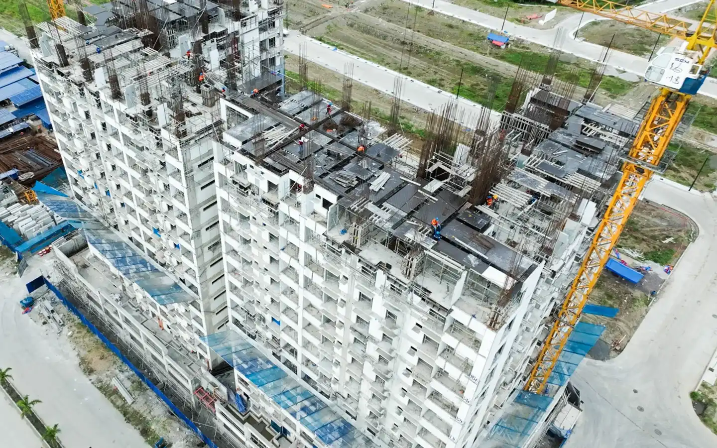 Aerial view showing the actual site construction and structural progress for 9 Central Park in Northwin Global City.
