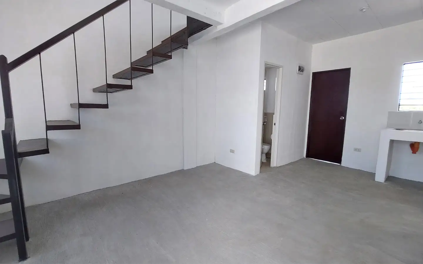 Trece Martires Townhouse Bare Turnover – Ground Floor Bare turnover finish of the ground floor of a townhouse in Trece Martires