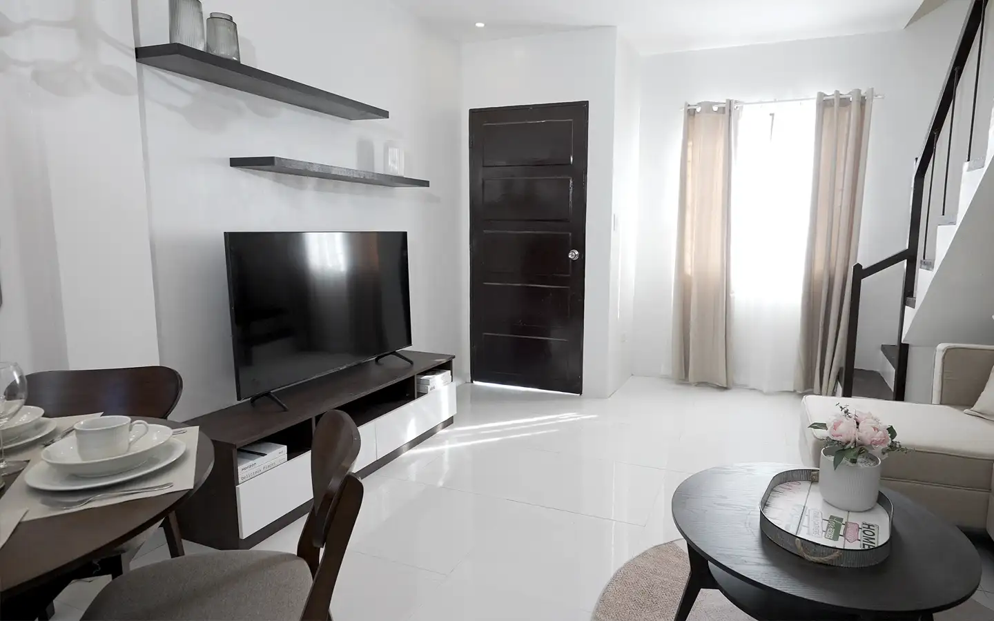 Trece Martires Townhouse Model Unit – Ground Floor Interior Another view of the dressed-up ground floor of the townhouse model unit