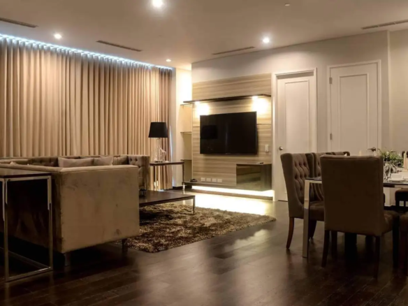Fully furnished living and dining area of a 2-bedroom condo at Trump Tower Manila